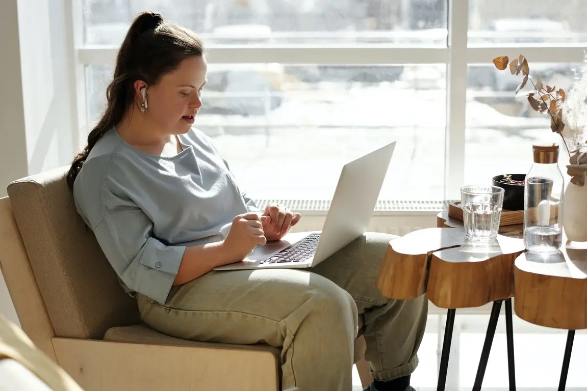 A young woman at her laptop